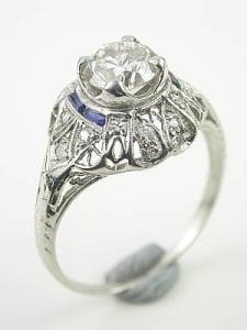 Art Deco Engagment Ring Art Deco vintage engagement ring flutters around the finger with an air of breathtaking elegance.