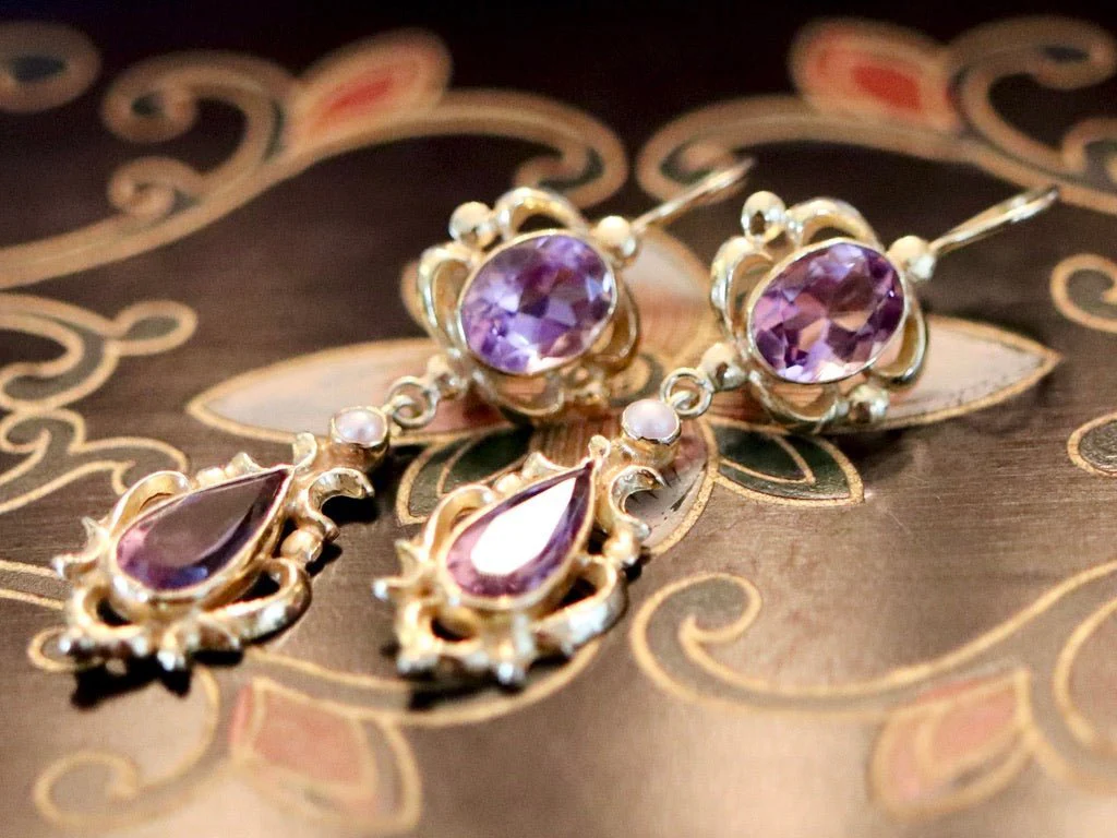 A Victorian ring from the Victorian jewelry era, with its floral motifs and vibrant gemstones, is a perfect piece