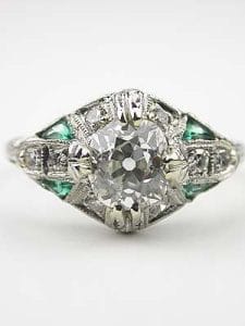 Vintage engagement ring with Emerald Accents